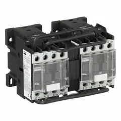 This reversing IEC contactor features 3 poles and 3 normally open (NO) contacts, rated for 9 A with a 24V AC coil. It is used for reversing the direction of three-phase motors in applications such as conveyors, hoists, and pumps. No integrated surge suppression is included.