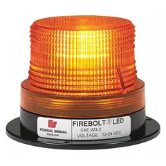 This FEDERAL SIGNAL beacon is an amber LED warning light with a round shape, 3 5/8 in overall height, and magnetic mount. It operates on 12/72V DC, provides 15 selectable flash patterns, and includes a lighter plug with cord for plug-in connection. Rated SAE Class 2, it is suited for temporary vehicle warning applications such as construction, utility, and emergency vehicles.
