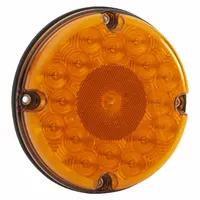 LED turn signal light with amber round lens, 7-inch diameter and height. Permanent screw mount and male bullet electrical connection. Complies with FMVSS 108 standards. Used on commercial vehicles, trailers, and heavy equipment for turn indication