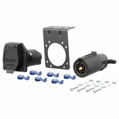 Plastic 7-way electrical plug for trailer and tow vehicle connections. Features a dust cover and snap locks for secure attachment. Used in towing electrical systems for lighting, brakes, and auxiliary functions on trailers, RVs, and fleet vehicles.