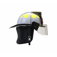 This fire and rescue helmet features a white fiberglass shell with a traditional rear brim for heat deflection and impact protection. It includes a chin strap and a 6 Point Sure Lock(R) Ratchet suspension system for secure fit during emergency operations. Suitable for structural firefighting and rescue scenarios.