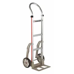 This corrosion-resistant hand truck features a silver aluminum frame and rubber tread-on-core wheels. With a 500 lb capacity and flow-back design, it is suited for moving heavy loads in industrial, warehouse, and commercial environments where rust resistance is required.