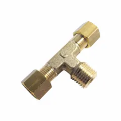 This brass compression fitting connects two 20 mm OD tubes and one 3/4 in pipe in a tee configuration. It is used in fluid systems to split or merge flow. The fitting is made of brass and features a standard sleeve design for secure tube connections.