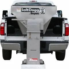 This vehicle battery-powered broadcast spreader mounts in a truck bed. It features a steel frame, a stainless steel hopper, and a conveyor chain drive mechanism. Suitable for distributing salt, sand, or fertilizer on roads, driveways, and parking lots.
