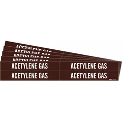Brown adhesive pipe marker with white legend reading 'Acetylene Gas'. Designed for pipe outer diameters from 3/4 to 2-3/8 inches. Pack includes 4 markers without directional arrows. Used for identifying acetylene gas lines in piping systems.