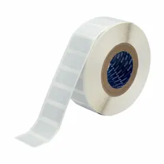 This precut label roll measures 1 in x 2 in and is made of silver polyester with halogen-free and metal-detectable properties. It is designed for use with the Brady i5100 printer series. Typical applications include industrial identification and labeling in environments requiring contamination detection, such as food processing, pharmaceutical, and electronics facilities.