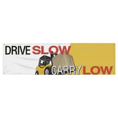 Poly sheeting banner with one printed side, measuring 28 in x 96 in. Suitable for indoor and outdoor use. Used in warehouses, factories, and construction sites to remind forklift operators and pedestrians to drive slowly and carry loads low.