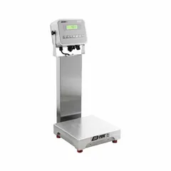 Industrial food scale with 18 x 18 inch weighing surface, 26 inch overall height, IP66 rating, and LCD display. Readability of 0.01 kg/10 g/0.02 lb/0.32 oz. Includes AQUASHIELD KIT and RS-232 port for data transfer. Suitable for wet environment weighing in food processing and packaging applications.