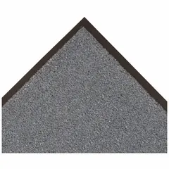 Indoor medium-duty cut pile mat made of polypropylene and vinyl. Measures 4 ft x 60 ft with a 5/16 in thickness. Designed to trap dirt and moisture at building entrances, reducing slip risks and floor wear in commercial lobbies, hallways, and high-traffic zones.