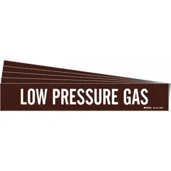 This adhesive pipe marker identifies low pressure gas lines. It features a brown background with white legend text and fits pipe outer diameters from 2-1/2 to 7-7/8 inches. The marker is supplied without arrows. Each pack contains 5 markers.