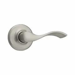 This storeroom lever lockset features a satin nickel-plated zinc finish and a rose style. It is ANSI F75 Hall function, allowing keyed entry from outside and free egress from inside. The ADA-compliant lever meets accessibility standards. Suitable for commercial or institutional doors such as storage rooms, utility closets, or back-of-house areas.