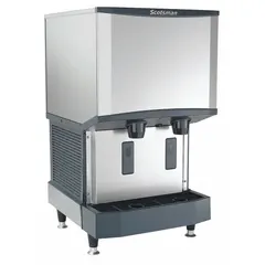 Air-cooled nugget ice maker and dispenser combination producing 500 lb of ice per day. Includes infrared sensor for automatic dispensing. Dimensions: 35 in H x 21 1/4 in W x 24 3/8 in D. Suitable for commercial kitchens, cafeterias, and healthcare facilities.