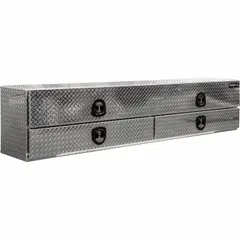 This topside storage box features dual flip-up drop-down doors for access from either side. It has a 90-inch overall width, a T-Handle Compression lock, and keyed entry. The silver-finished steel construction is suited for securing tools and equipment on commercial trucks in fleet maintenance, construction, and utility applications.