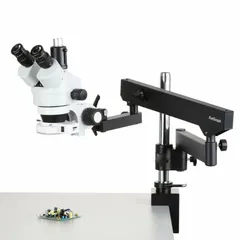 This trinocular stereo microscope offers a magnification range of 3.5X to 225X with a 200 mm working distance, suitable for detailed inspection and assembly tasks. LED illumination provides consistent lighting for viewing small components and specimens. Typical applications include quality control, precision manufacturing, and laboratory examination.