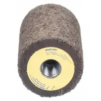 This NORTON grinding plug is a Type 18 cone with a square tip, measuring 1 1/2" x 3" and featuring a 5/8"-11 threaded arbor. It uses 20-grit Zirconia Alumina abrasive with hardness grade S, suited for heavy stock removal and blending on stainless steel and nickel alloys in industrial fabrication and maintenance applications