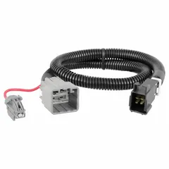 Pre-wired harness for connecting a brake controller to a trailer's electrical system. Overall length 24 in, width 1 in, height 1 in. Simplifies installation in towing applications.
