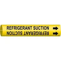 Snap-on pipe marker for identifying refrigerant suction lines in HVAC and refrigeration piping systems. Yellow background with black legend text and directional arrows. Fits pipe outer diameters from 1-1/2 to 2-3/8 inches. Supplied as a single marker