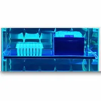 This UVC transparent shelf is made from a proprietary material and measures 10 inches in overall length and 7 inches in overall width. It is designed for use with the B1450 fume hood model, providing a work surface that allows UV-C light penetration for sterilization applications