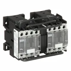 This reversing IEC contactor from Dayton features 3 poles and 3 normally open (NO) contacts, rated for 12 A with a 240V AC coil. It is used for reversing motor control in applications such as conveyors, pumps, and hoists, enabling direction change of three-phase motors. No integrated surge suppression is included.
