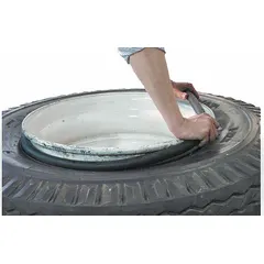 This rubber tire bead seater is designed for seating beads on truck tires. With an overall length of 19 1/2 inches, it aids in creating a seal between the tire bead and rim during inflation. Suitable for use in heavy-duty vehicle maintenance.
