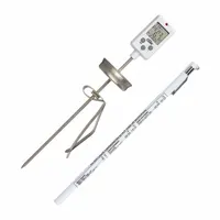 This candy and frying thermometer features a multiline LCD display and a metal-detectable ABS plastic case with LCD lens. It has an overall length of 10 7/8 inches and an accuracy of ±1.5 °F. Suitable for precise temperature monitoring in candy making, frying, and other food-processing applications