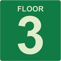 This adhesive square floor sign measures 8 inches by 8 inches and is designed for mounting on floors or other surfaces. It features glow-in-the-dark photoluminescent material for visibility in low-light conditions. The sign is not retroreflective. Typical applications include marking emergency exits, safety zones, or pathways in industrial facilities.