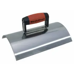 Wall capping trowel with a 6-inch stainless steel blade. Features a DuraSoft rubberized handle for grip. Used for finishing and smoothing mortar or concrete caps on walls.