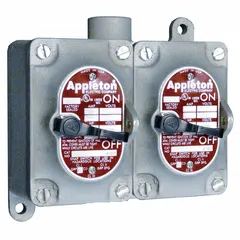 Two-gang front lever tumbler switch with 2-pole, 20 A, 277 V AC rating. Features a dead-end hub with 3/4 in hub size for secure conduit mounting. Used for on/off control of lighting and motor circuits in industrial environments.