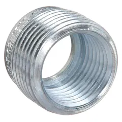 Steel reducing bushing for hazardous locations, reducing a 2-inch trade size opening to 1 inch. Used in conduit systems or enclosures to adapt connections in classified environments.
