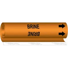 Orange wrap-around pipe marker with black 'Brine' legend and directional arrows. Fits pipe outer diameters from 2-1/2 to 7-7/8 inches. Used to identify brine piping systems in industrial facilities, indicating pipe content and flow direction.
