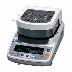 Halogen-heated moisture analyzer with 71 g capacity and 0.0001 g readability. Temperature range 30°C to 200°C. Features VFD display and RS232C interface. Moisture measurement repeatability 0.05% to 0.01%. Used for moisture content determination in industrial laboratories and quality control.