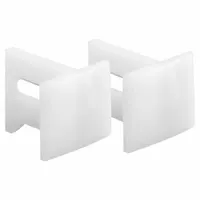 This hanging door guide provides lateral stability and alignment for sliding or bypass door systems. It measures 1 1/8 inches in length and 3 3/4 inches in width, supplied as a single piece. The guide keeps the door properly positioned within the track, preventing sway and ensuring smooth operation