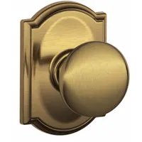This passage knob lockset is designed for interior doors that do not require locking, such as closets or hallways. The brass construction and Camelot style offer a decorative finish. Suitable for residential or light commercial applications where privacy locking is unnecessary