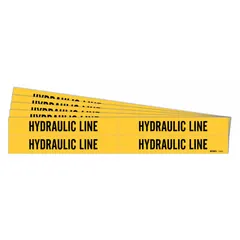 Yellow adhesive pipe marker with black legend reading 'Hydraulic Line' for identifying hydraulic piping in industrial facilities. Fits pipe outer diameters from 3/4 to 2-3/8 inches. Pack includes 4 markers without arrows, sold as a 5-pack. High-visibility color scheme aids quick recognition during maintenance or emergency response.