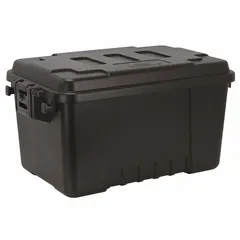 This black plastic storage trunk measures 24 in x 15 in x 13 in and features two molded handles for carrying. The padlock closure allows for secure storage of tools, equipment, or supplies in industrial settings such as job sites, warehouses, or maintenance facilities.