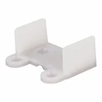 This hanging door guide from PRIME-LINE is used to align and stabilize doors in track systems, ensuring smooth travel and reducing wear. It measures 3 3/4 inches in width and is suitable for maintenance and repair applications in industrial or commercial settings