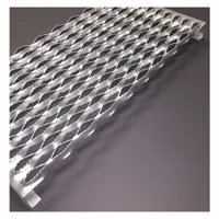This steel channel features a serrated surface for slip resistance. It is used as a stair tread or structural channel component in industrial walkways, platforms, and mezzanines