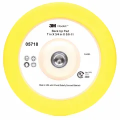 This 7-inch diameter rubber backup pad features a hook-and-loop surface that centers compounding or polishing pads. With a 1/2-inch thickness and yellow color, it is designed for use with rotary sanders in surface preparation and finishing tasks.