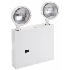 Indoor, surface-mount emergency light with a white 20-GA steel housing. Operates on 120/277V AC, uses a 9 W incandescent lamp, and provides 18 W emergency wattage. Features adjustable lamp heads for directing light. UL 924 listed. Not remote capable; no self-diagnostics.