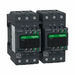 Reversing IEC contactor with 3 poles and 3 normally open contacts, rated for 40 A. Coil voltage is 120V AC/240V AC. No integrated surge suppression. Used for controlling motor direction in three-phase applications such as conveyors, pumps, and industrial machinery.