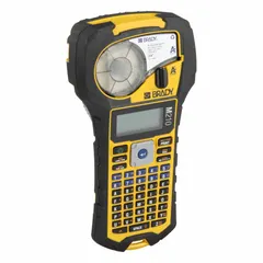 Handheld label printer with 3/4" print width and 203 dpi resolution. Includes battery, replacement power cord, and M21 Series Nylon Cloth labels for patch panel, wire, and cable identification. Suitable for on-site labeling in industrial environments.
