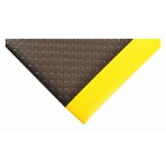 This wear-resistant antifatigue mat measures 4 ft x 60 ft and is 1/2 in thick. It is constructed from PVC foam in black with a yellow border and features an anti-slip backing. Suitable for use in industrial workstations, assembly lines, and high-traffic areas to reduce fatigue from prolonged standing.