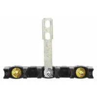 This terminal block is a replacement part for ovens and ranges, used to connect power supply wires to heating elements and controls. It provides a secure electrical connection for appliance operation