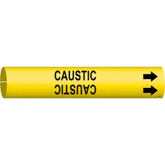 Yellow snap-on pipe marker with black legend 'Caustic' and directional arrows. Fits pipe outer diameters of 4 to 6 inches. Used to identify pipes carrying caustic substances in industrial facilities, aiding in hazard recognition and flow direction indication.