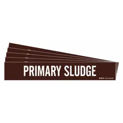 Brown adhesive pipe marker with white legend reading 'Primary Sludge'. Fits pipe outer diameters of 8 inches and larger. Each pack contains 5 markers, each without directional arrows. Used to identify pipes carrying primary sludge in industrial and wastewater treatment facilities.