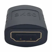 This audio/video adapter features one HDMI female connector on each end, allowing two HDMI cables to be joined for extended reach. It supports a maximum refresh rate of 60 Hz and is finished in black. Commonly used in home theater, conference room, or digital signage setups where longer cable runs are needed