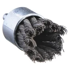 Twisted steel end brush for heavy cleaning of carbon steel surfaces. Used for removing rust, scale, and weld splatter in industrial maintenance and fabrication. Diameter 3/4 in, fill diameter 0.014 in, shank 1/4 in.