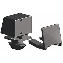 Fastenerless panel mounting block for securing solid panels in 10 Series structural framing. Made of black polyamide with unfinished finish. Compatible with inch-size solid panels. Used in industrial enclosures, machine guarding, and framing systems requiring tool-free panel installation.