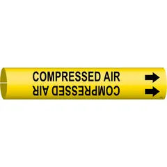 Yellow snap-on pipe marker with black legend reading 'Compressed Air' and directional arrows. Fits pipe outer diameters from 3/4 to 1-3/8 inches. Used to identify compressed air lines in industrial piping systems.