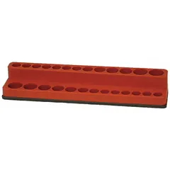 This socket tray is made of red polypropylene and has an overall width of 9 3/8 inches. It features 26 posts/slots for organizing standard and deep sockets. The magnetic back allows secure attachment to metal surfaces such as toolboxes or workbenches, providing convenient access in workshops, garages, and industrial maintenance areas.